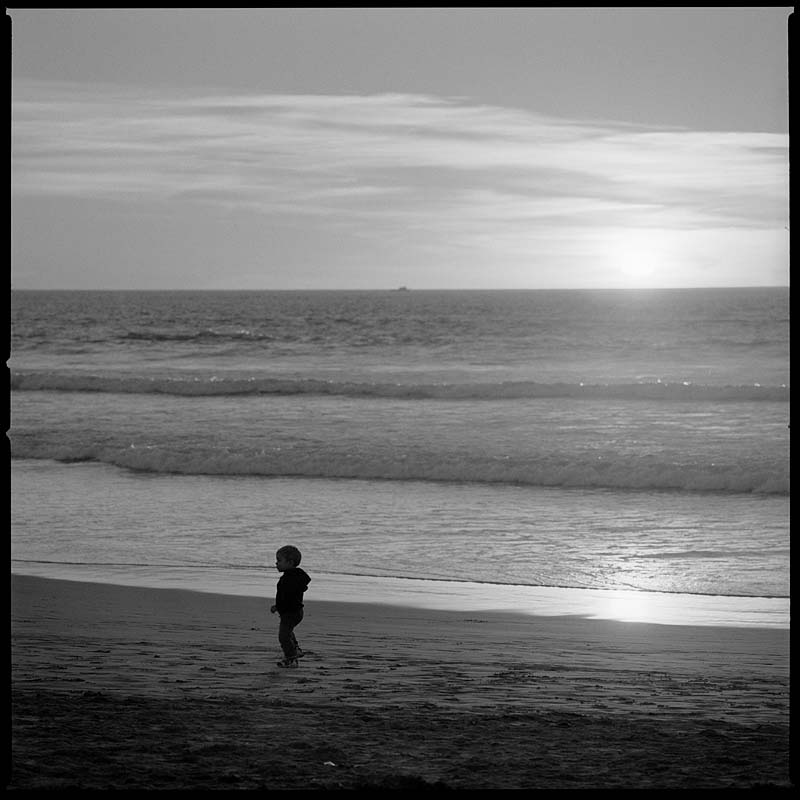 child-on-beach-sillouette